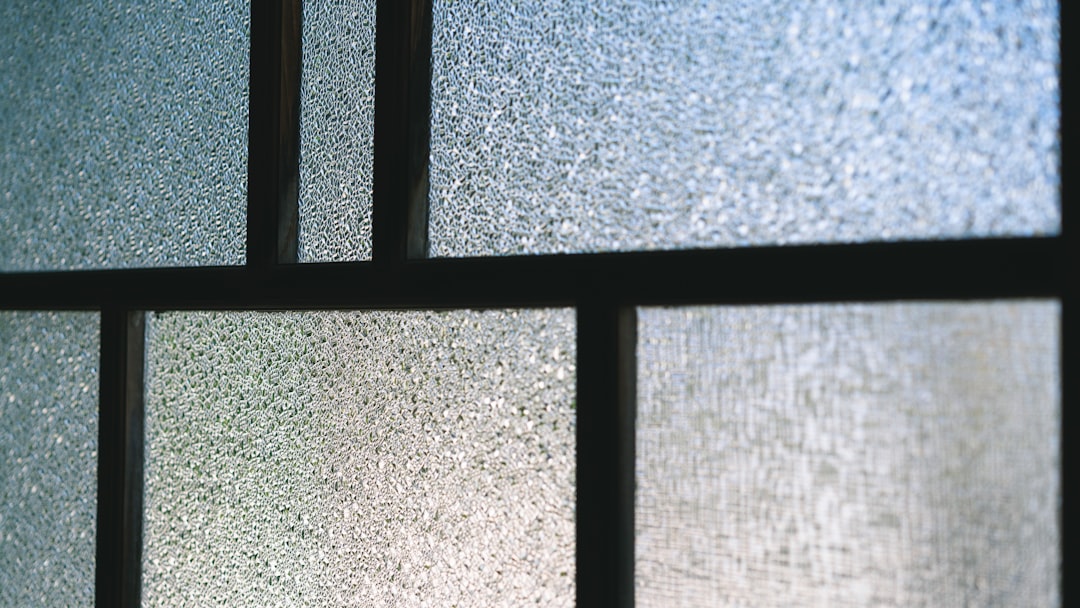 a close up of a window with frosted glass
