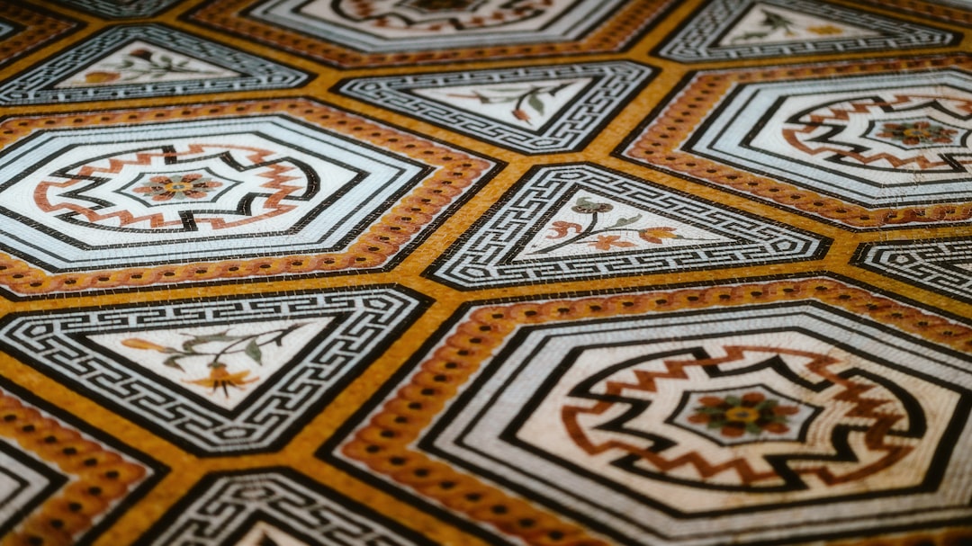 A close up of a floor with a pattern on it