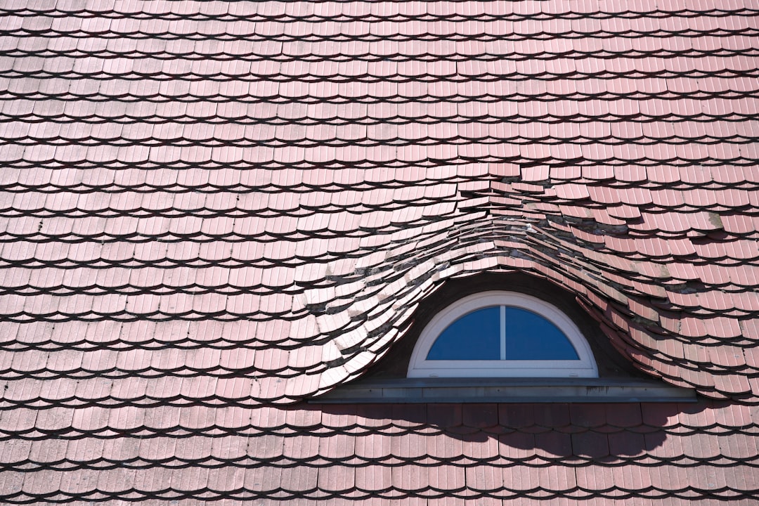 Dormer window on a shingled roof